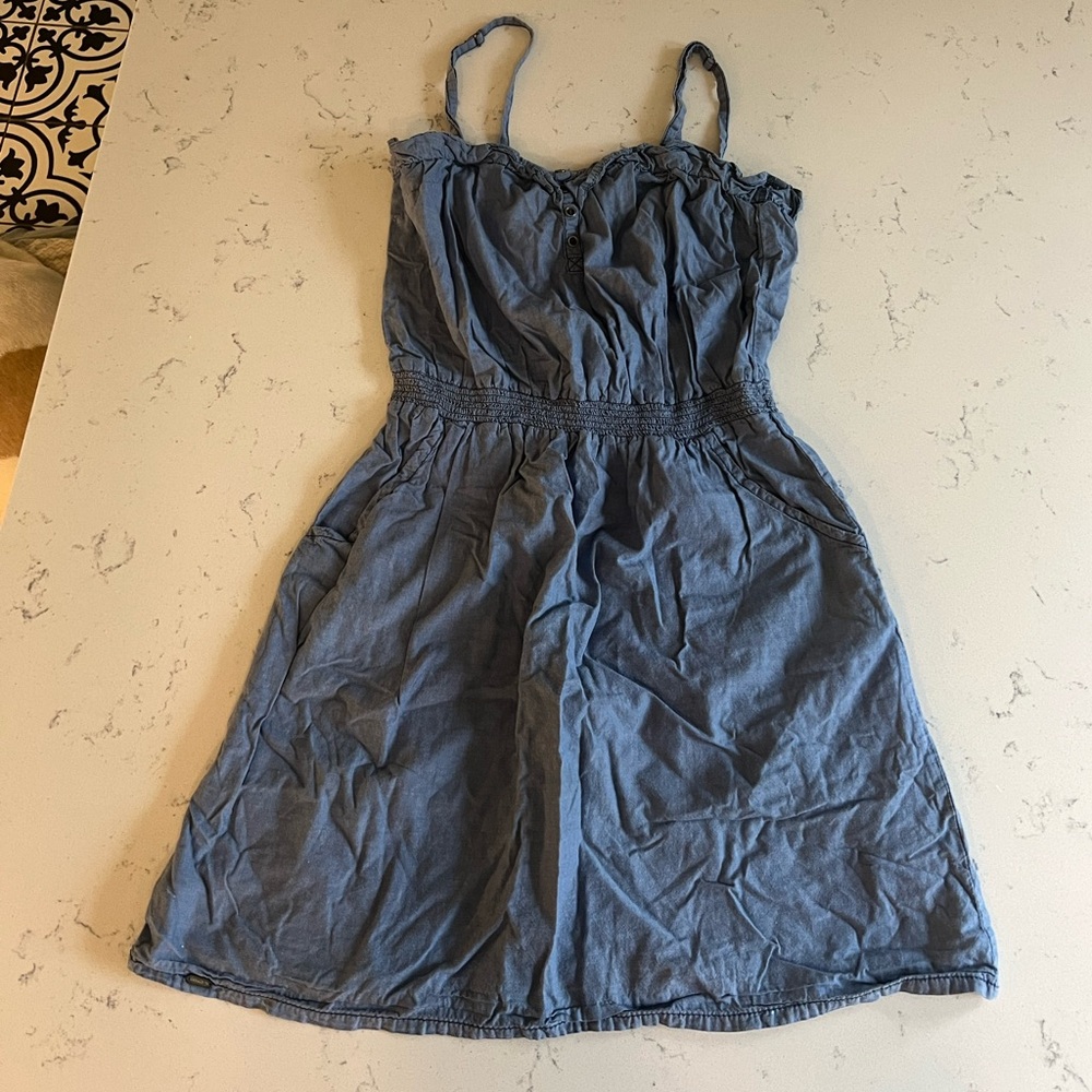 Light weight chambray dress with removable straps.